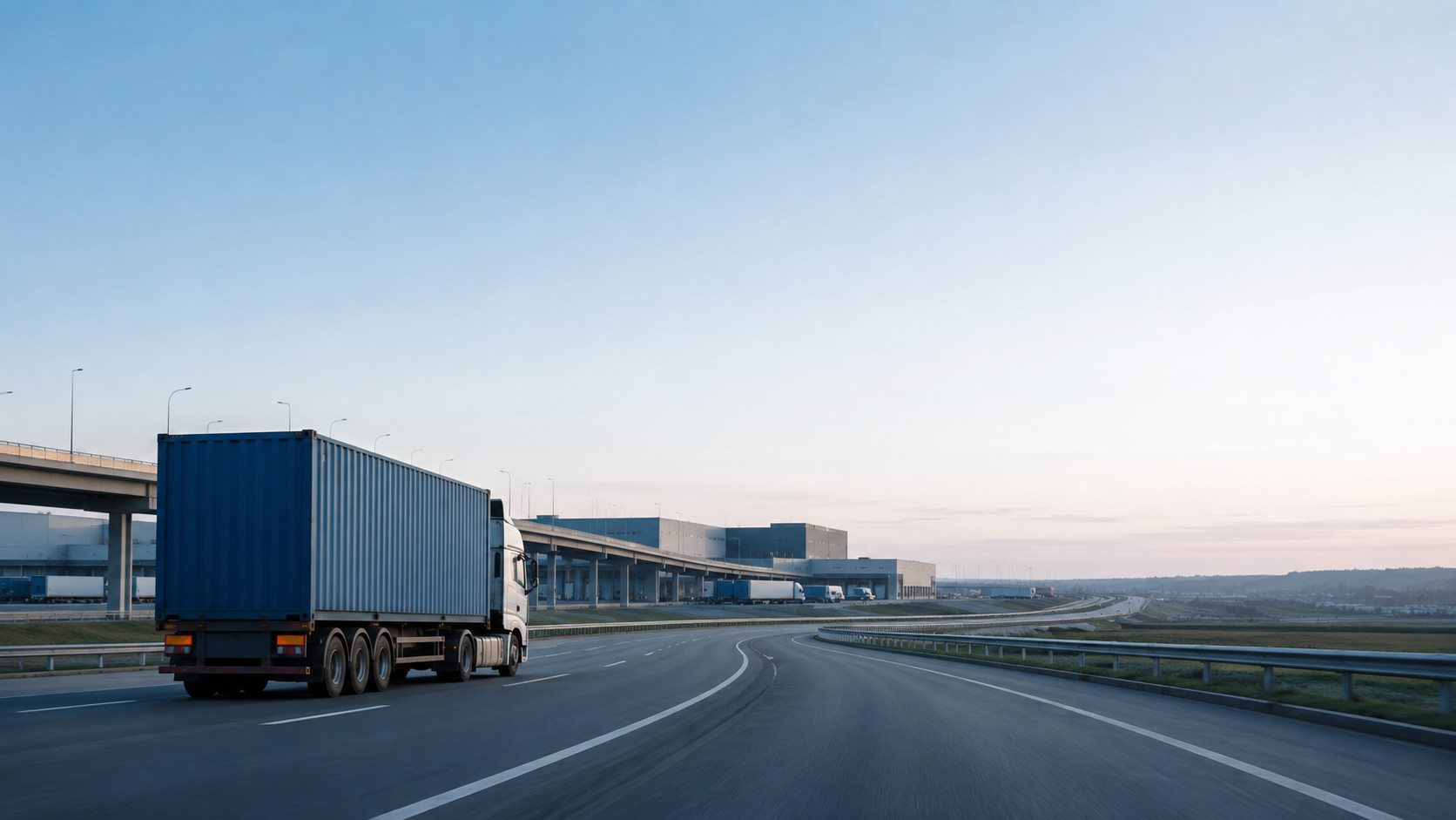 Container truck travelling from a logistics hub